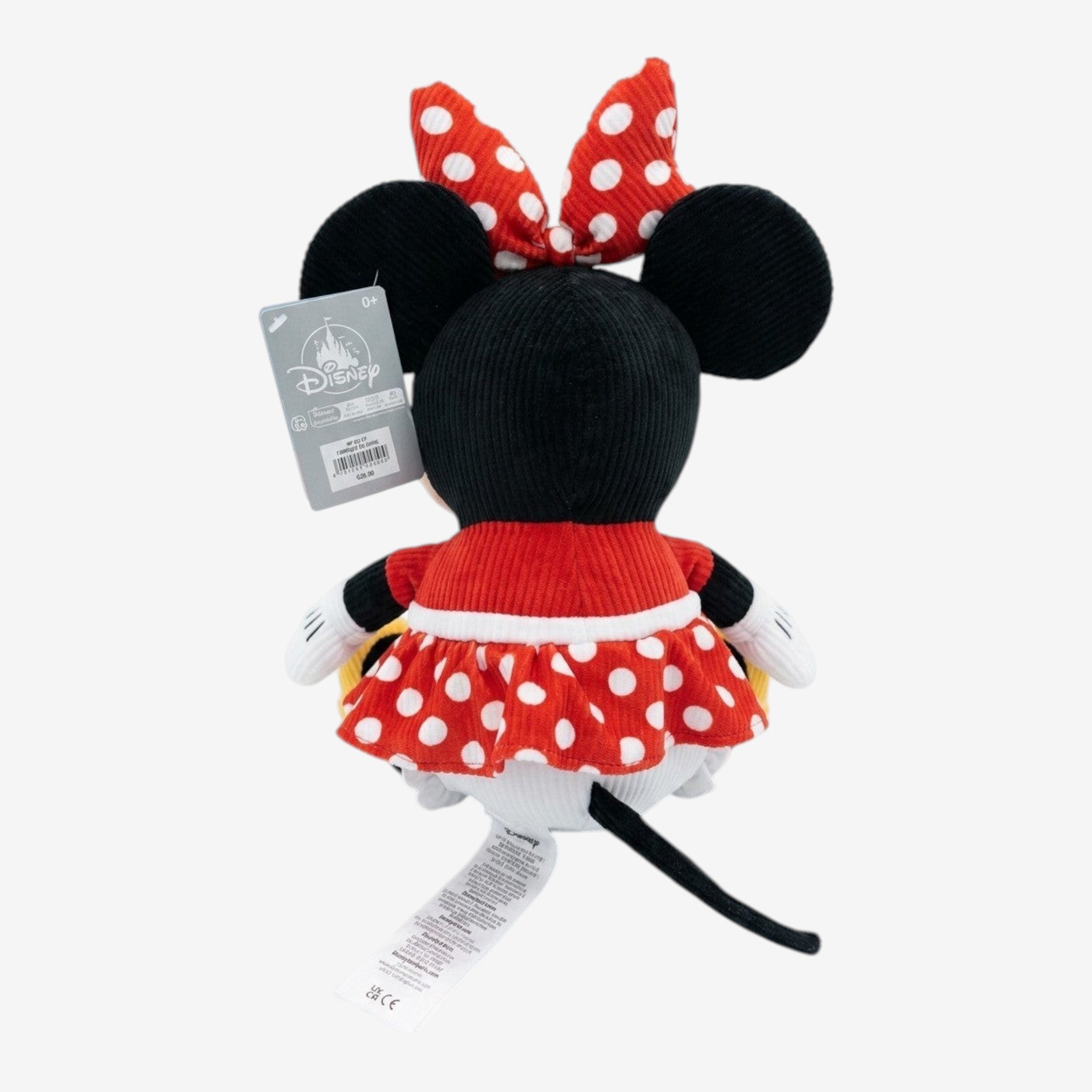Once Upon Magic Minnie Mouse corduroy plush toy in red polka dot dress and bow, black ears, white gloves, and yellow shoes.