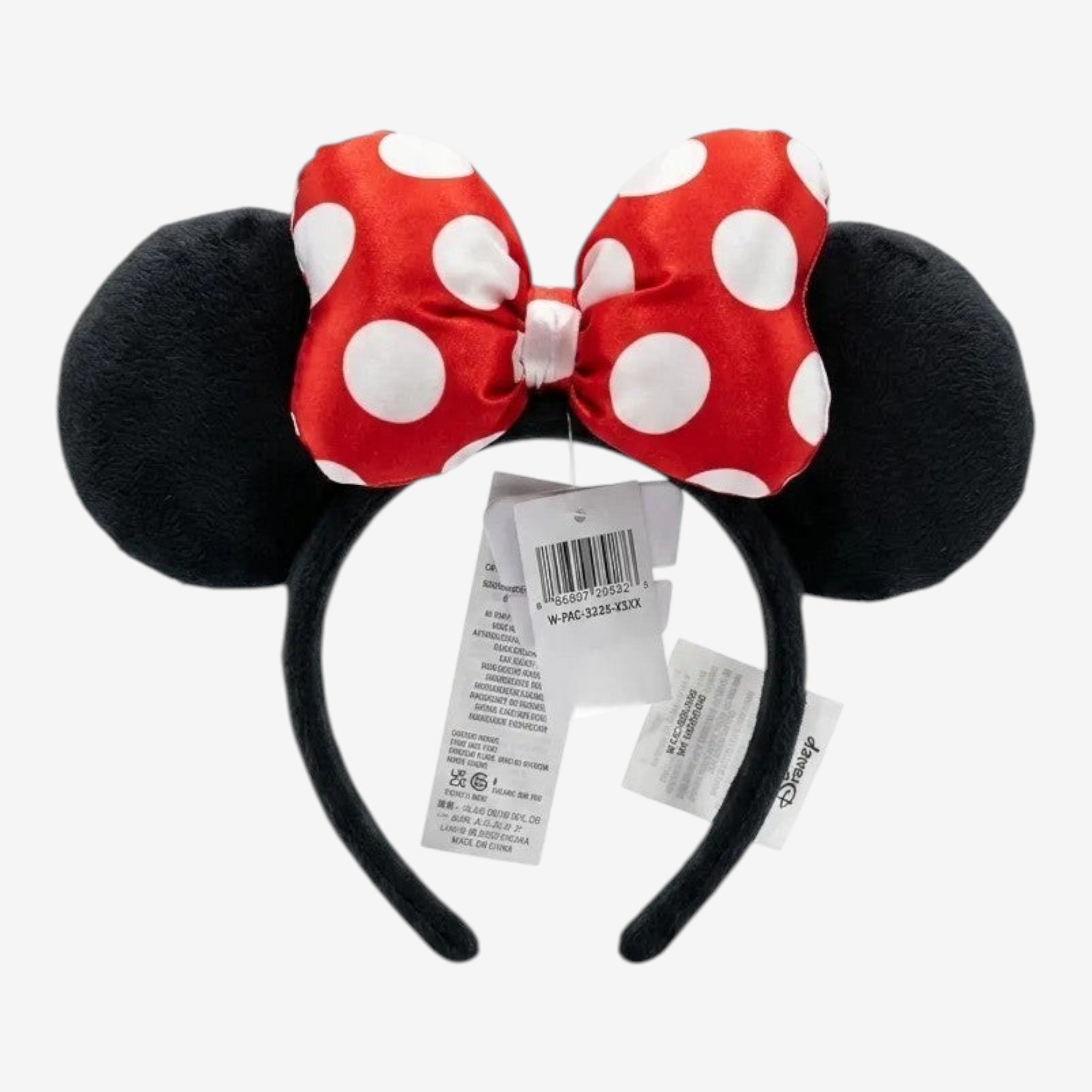 Once Upon Magic Minnie Mouse ears headband with plush black ears and a red polka dot bow. Soft, durable, and comfortable for all-day wear.
