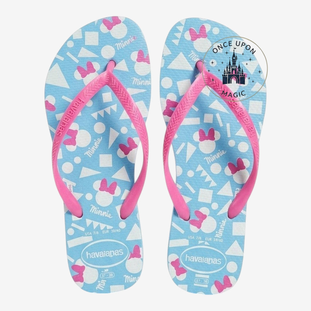 Once Upon Magic sky blue rubber flip-flops with pink Minnie Mouse bows and geometric pattern. Hot pink thong straps.