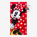 Once Upon Magic red Minnie Mouse bath towel featuring a white polka dot pattern and iconic character design.