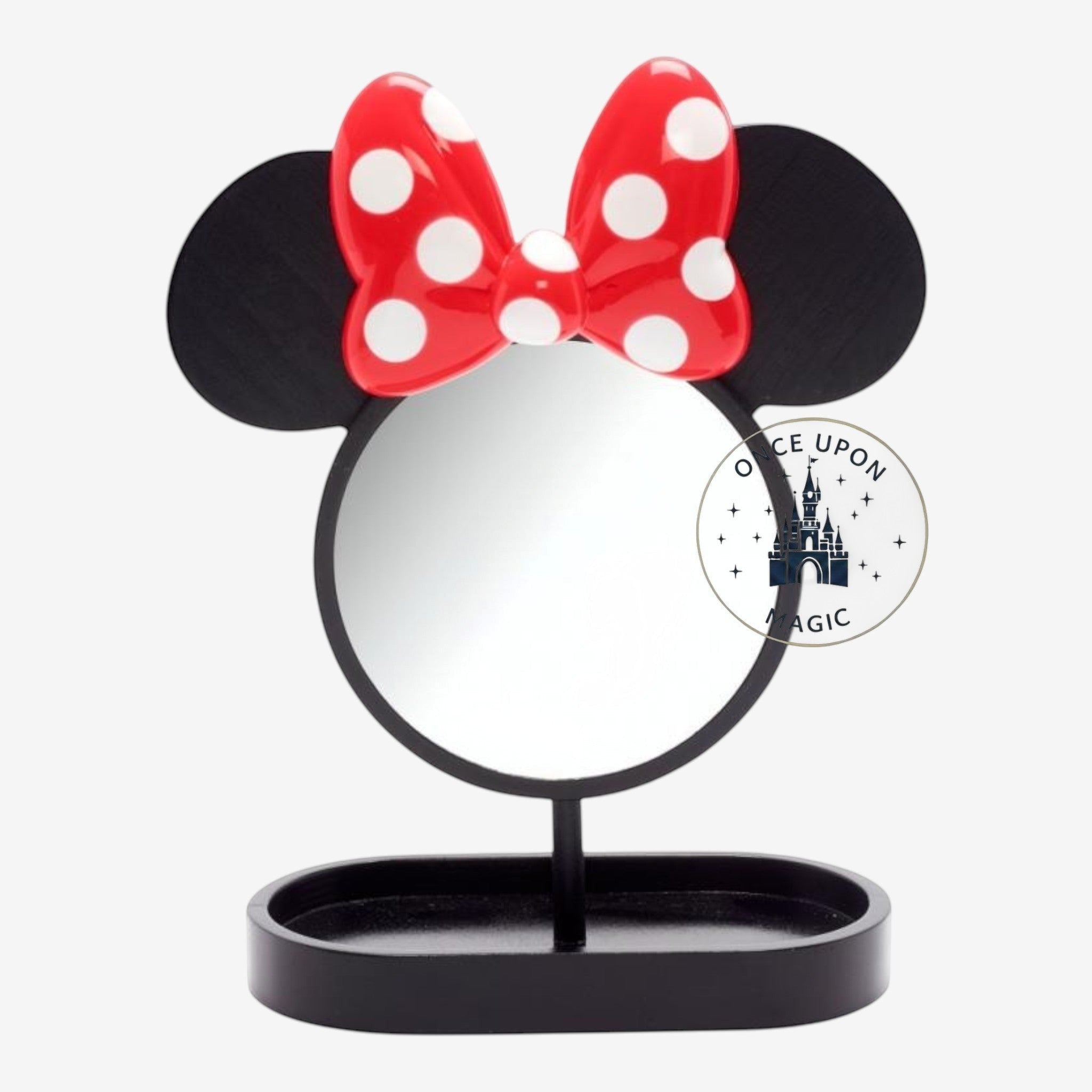 Once Upon Magic black standing mirror with Minnie Mouse ears and red polka dot bow on top. Features a small tray at the base.
