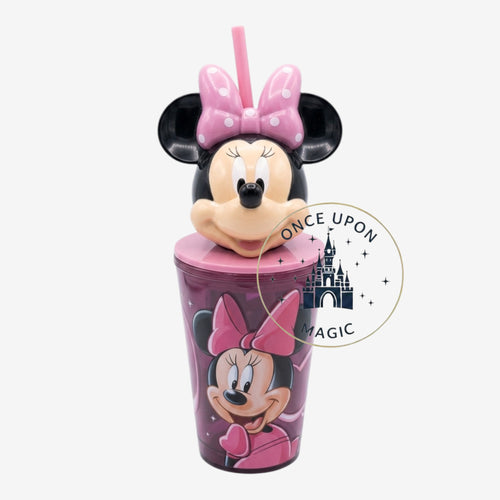 Once Upon Magic pink Minnie Mouse tumbler with straw, featuring Minnie's face and bow on the lid and character art on the cup.