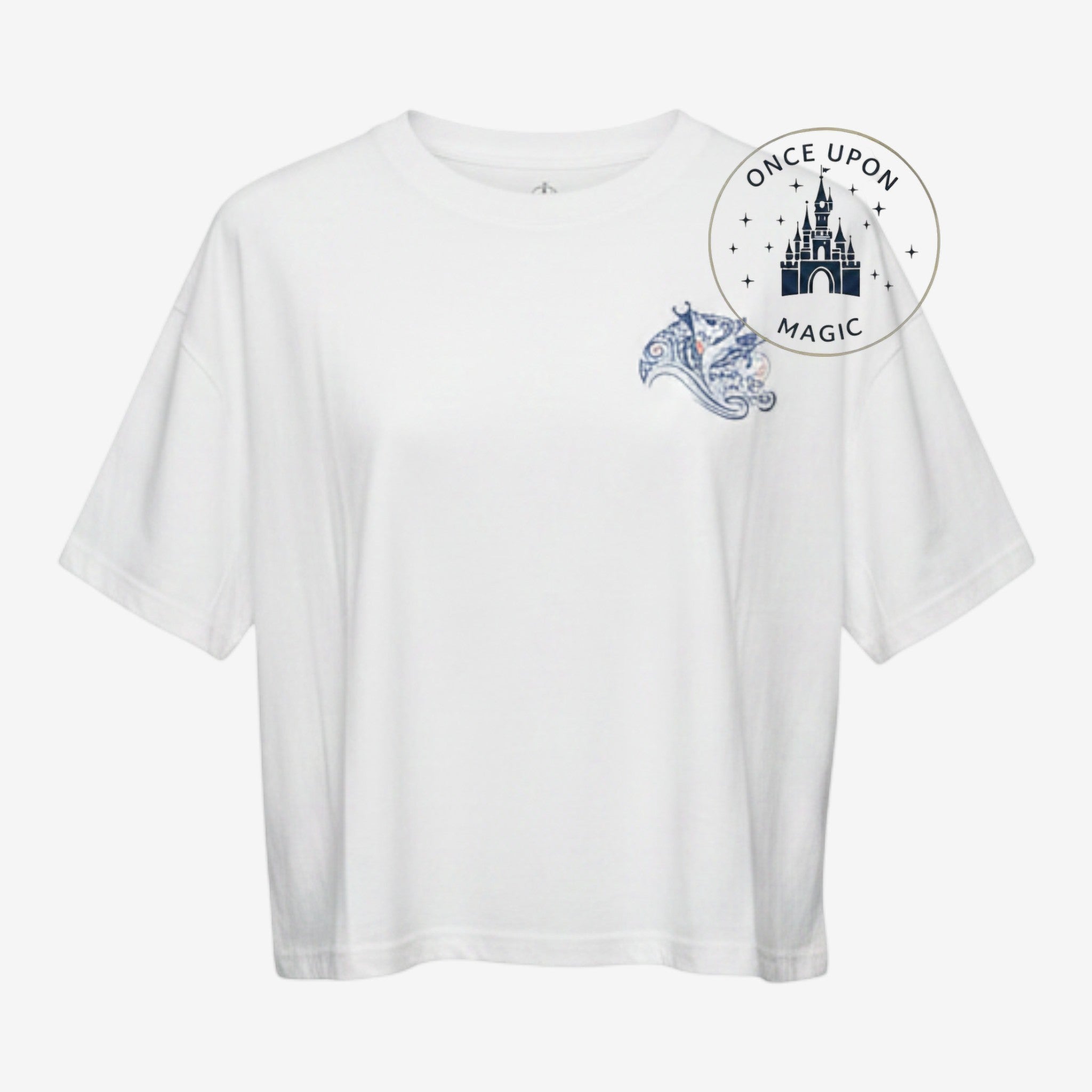 Once Upon Magic white cotton t-shirt featuring a small blue Moana-inspired graphic on the chest.