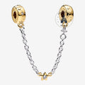 Once Upon Magic Pandora x Disney gold and silver castle charm safety chain with star accent.