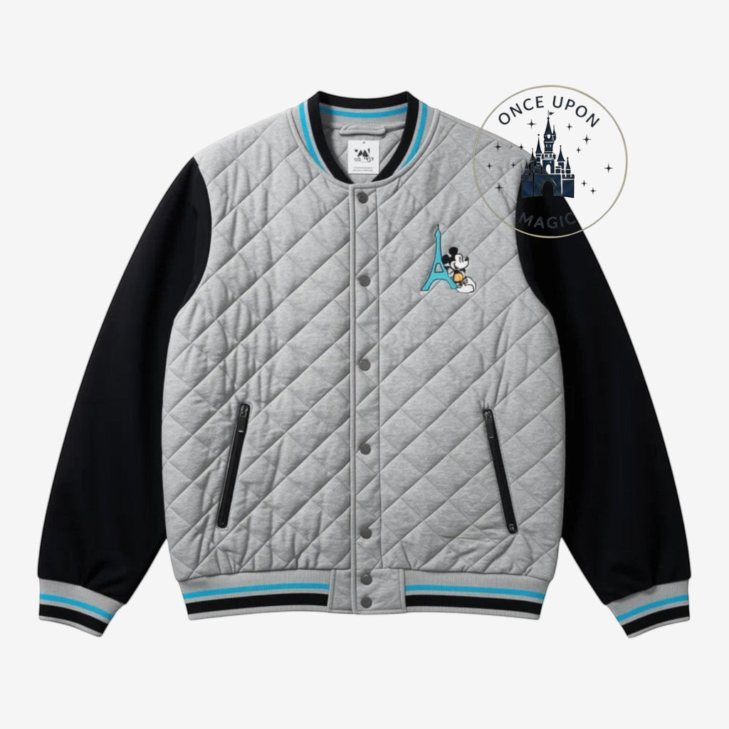 Once Upon Magic grey quilted teddy jacket with black sleeves, featuring Mickey Mouse and the Eiffel Tower graphic. Ribbed cuffs and collar.
