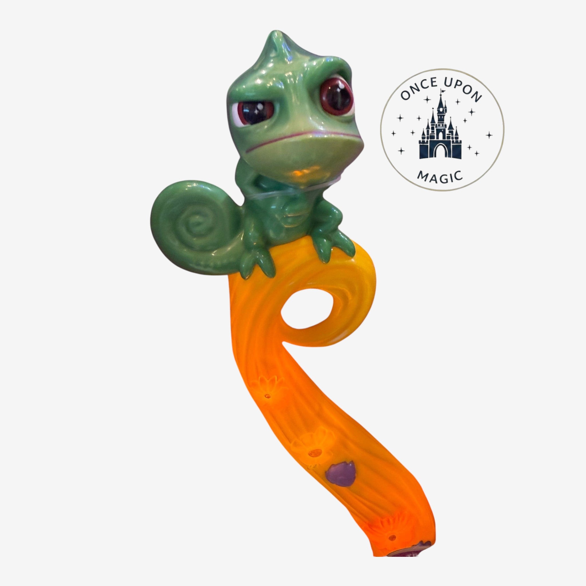 Once Upon Magic Rapunzel bow handle featuring a detailed green Pascal chameleon figure with golden floral accents