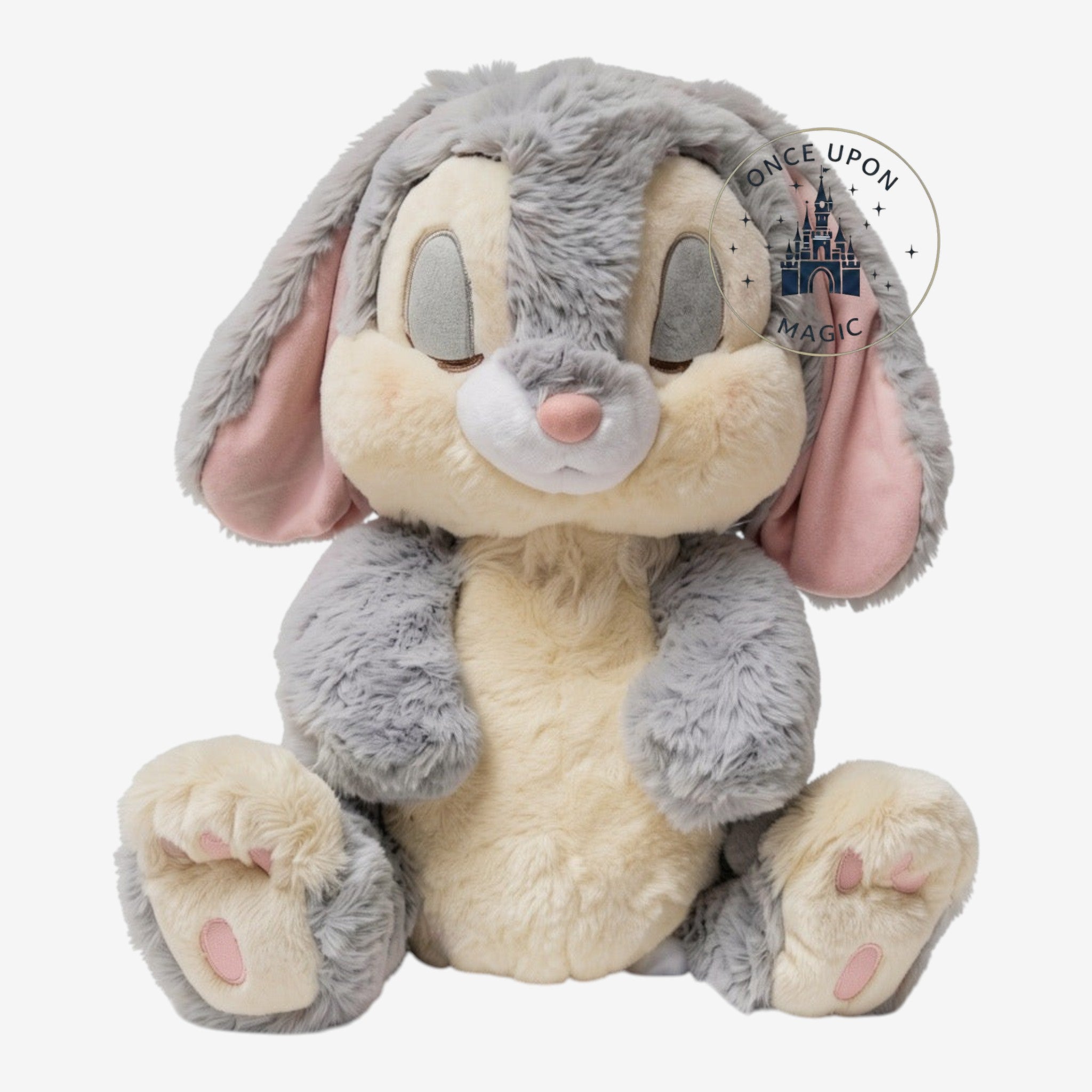 Peluche Once Upon Magic Panpan de Bambi, lapin gris et crème ultra doux, produit officiel Disneyland Paris.