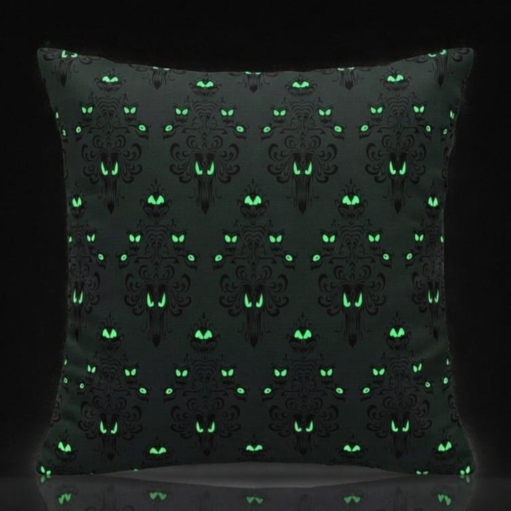Once Upon Magic Phantom Manor glow in the dark cushion with green eyes pattern on black fabric