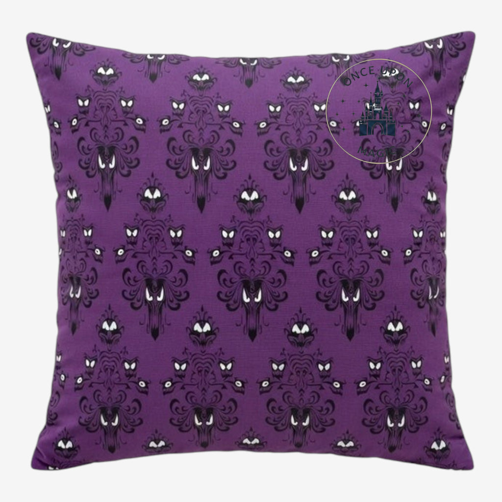 Once Upon Magic Phantom Manor purple cushion with a gothic wallpaper pattern featuring mysterious eyes and faces