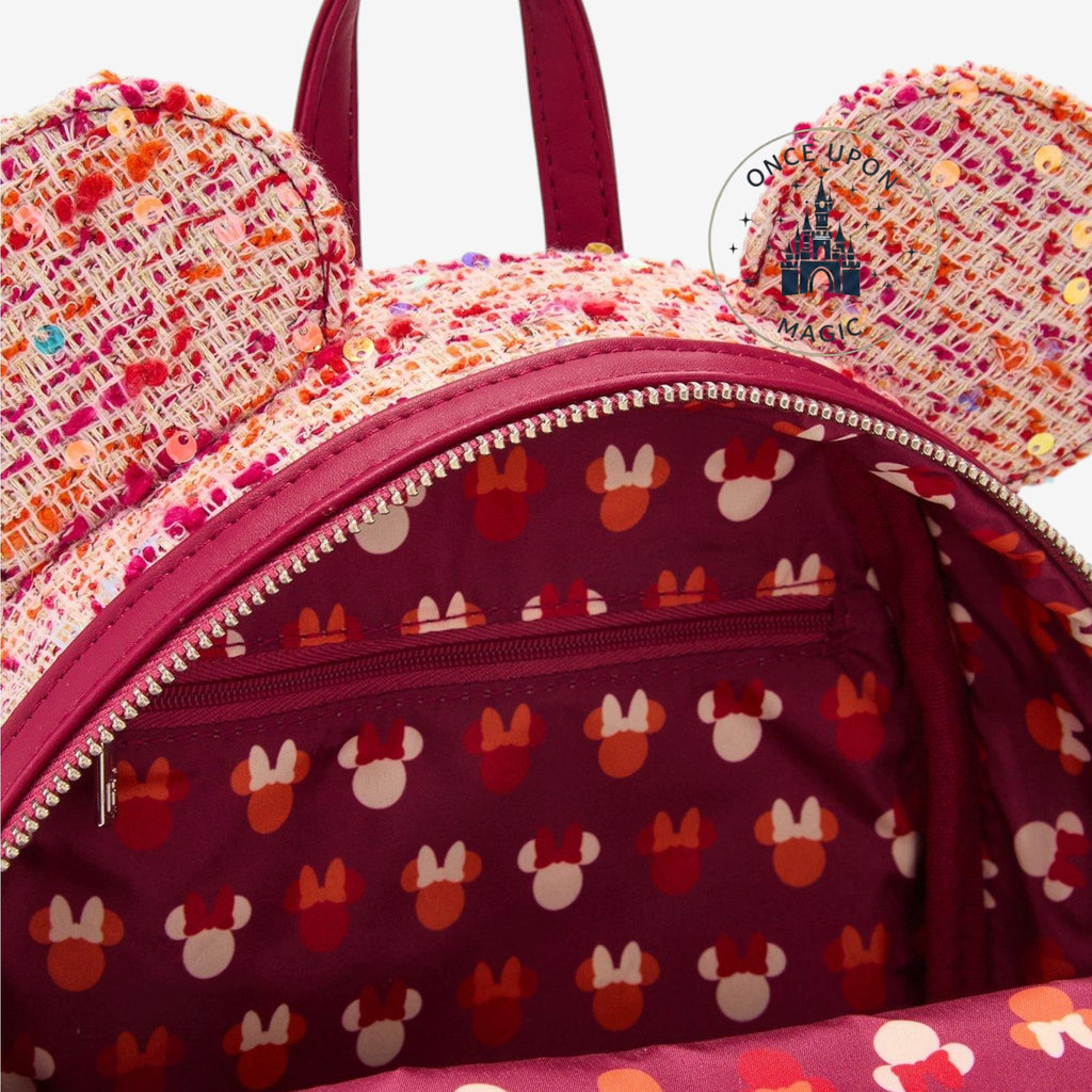 Once Upon Magic pink bouclé fabric mini backpack with Minnie Mouse ears, sequins, and a velvet bow.