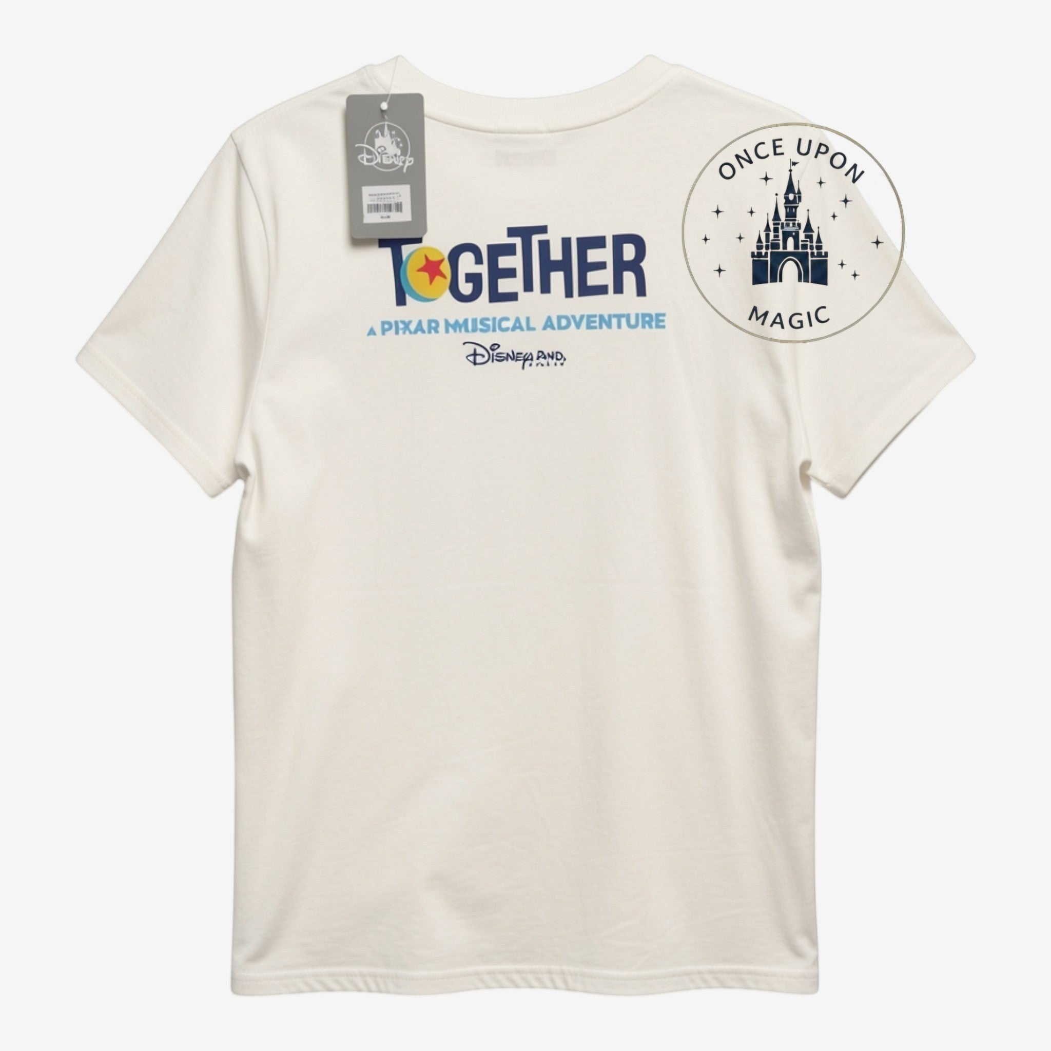 Once Upon Magic white t-shirt featuring the Together: A Pixar Musical Adventure logo on the back with a price tag.