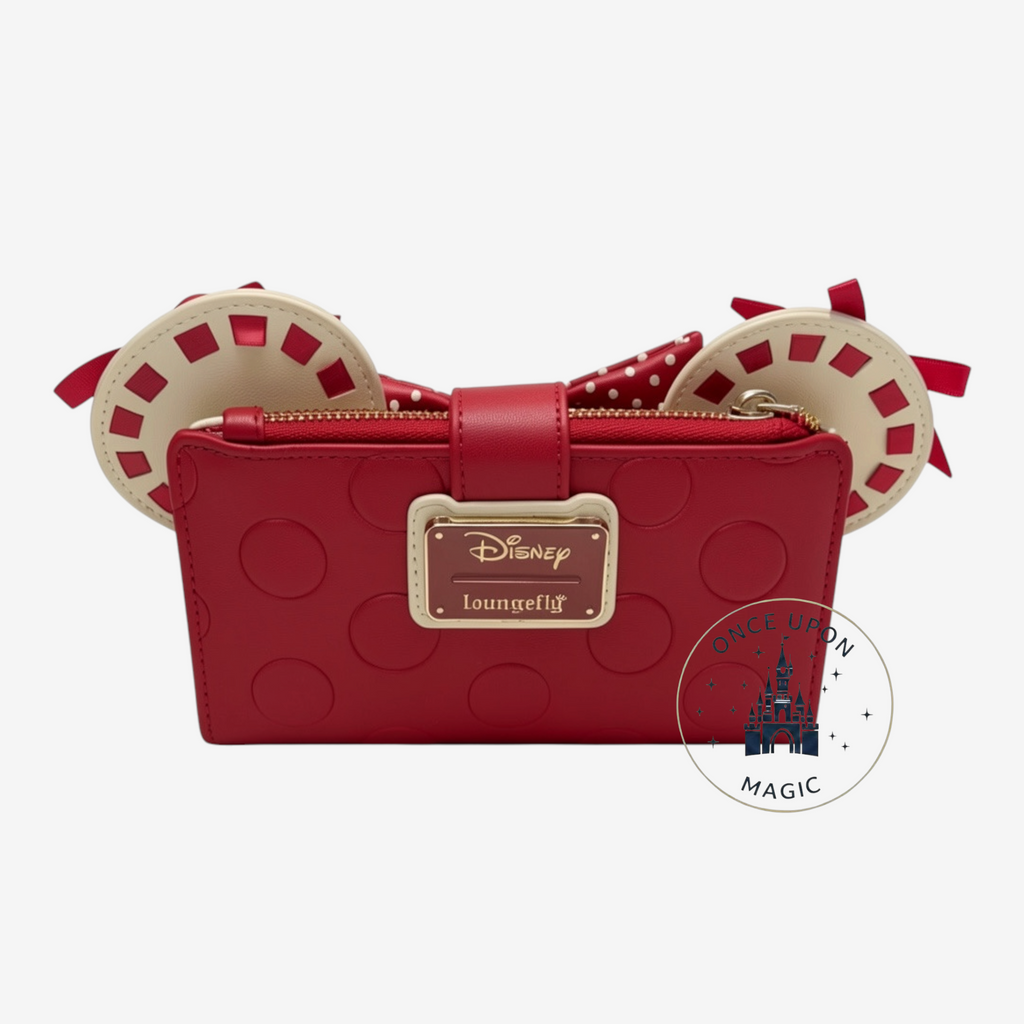 Portefeuille Loungefly Disney Minnie Mouse rouge à pois blancs en similicuir avec nœud et oreilles. Fermeture zippée.