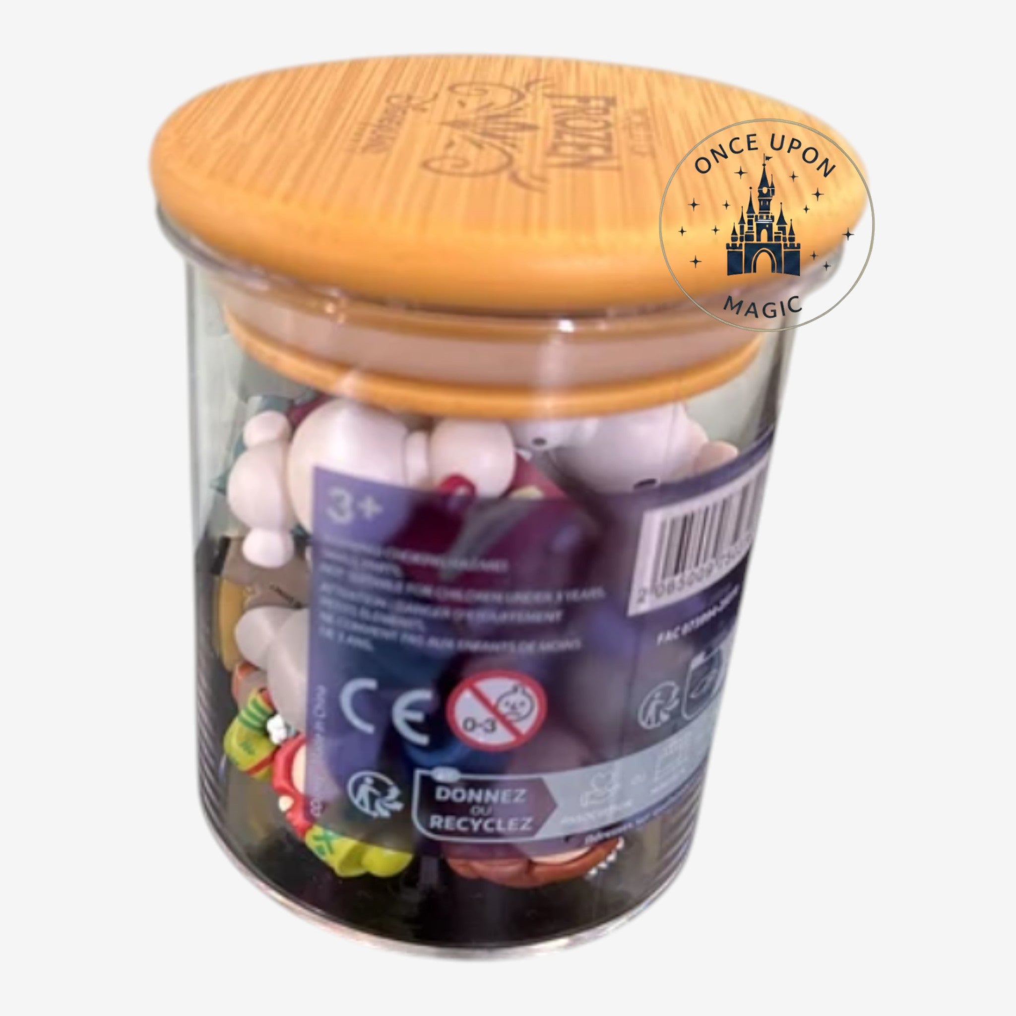 Pot surprise Once Upon Magic avec mini figurines World of Frozen, couvercle jaune et bocal en verre transparent.