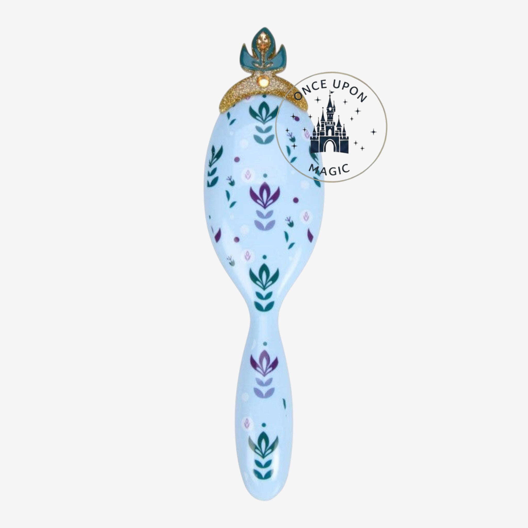 Once Upon Magic light blue hair brush with floral motifs and a crown detail, inspired by Anna from Frozen.