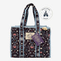 Once Upon Magic quilted floral tote bag with dark base, pink and blue flower print, and light blue trim.