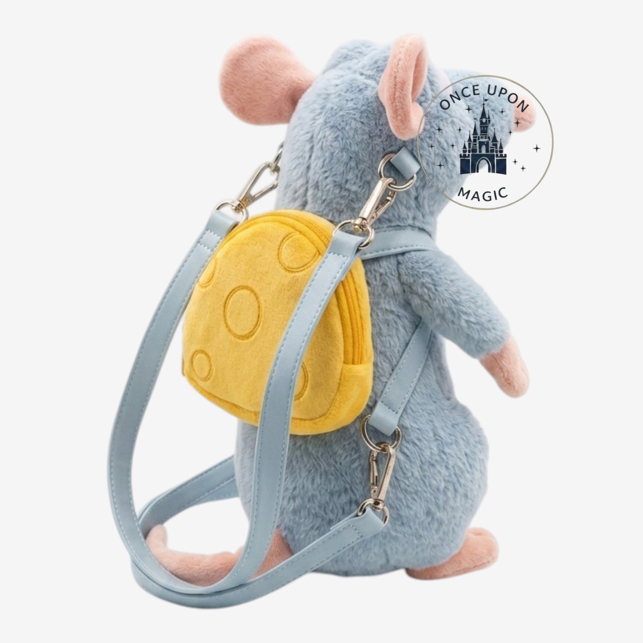 Once Upon Magic plush Remy crossbody bag with yellow cheese backpack detail. Blue faux leather strap.
