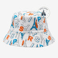 Once Upon Magic reversible bucket hat with white, blue, and orange "PARIS" text and Eiffel Tower graphics.