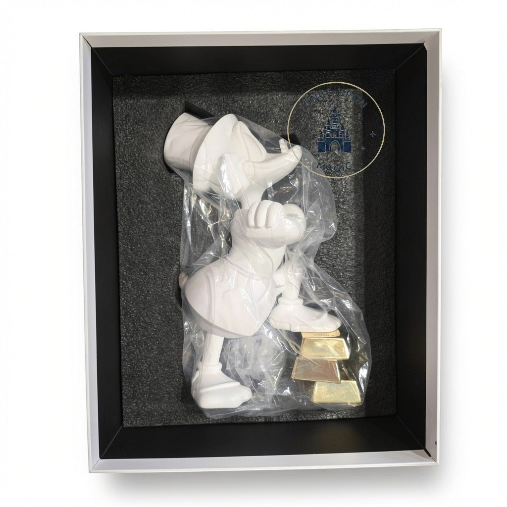 Once Upon Magic white Scrooge McDuck collector sculpture by Leblon Delienne with gold bars in a display box