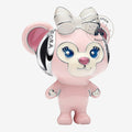Once Upon Magic Shelliemay charm, a pink Disney bear with blue eyes and a white bow, made of metal and enamel.