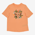 Once Upon Magic orange cotton t-shirt with a graphic of young Simba surrounded by colorful leaves and tribal patterns.