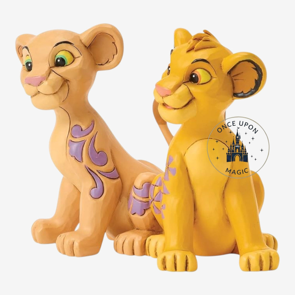 Once Upon Magic Simba and Nala figurine with carved wood texture and purple floral accents on a white background