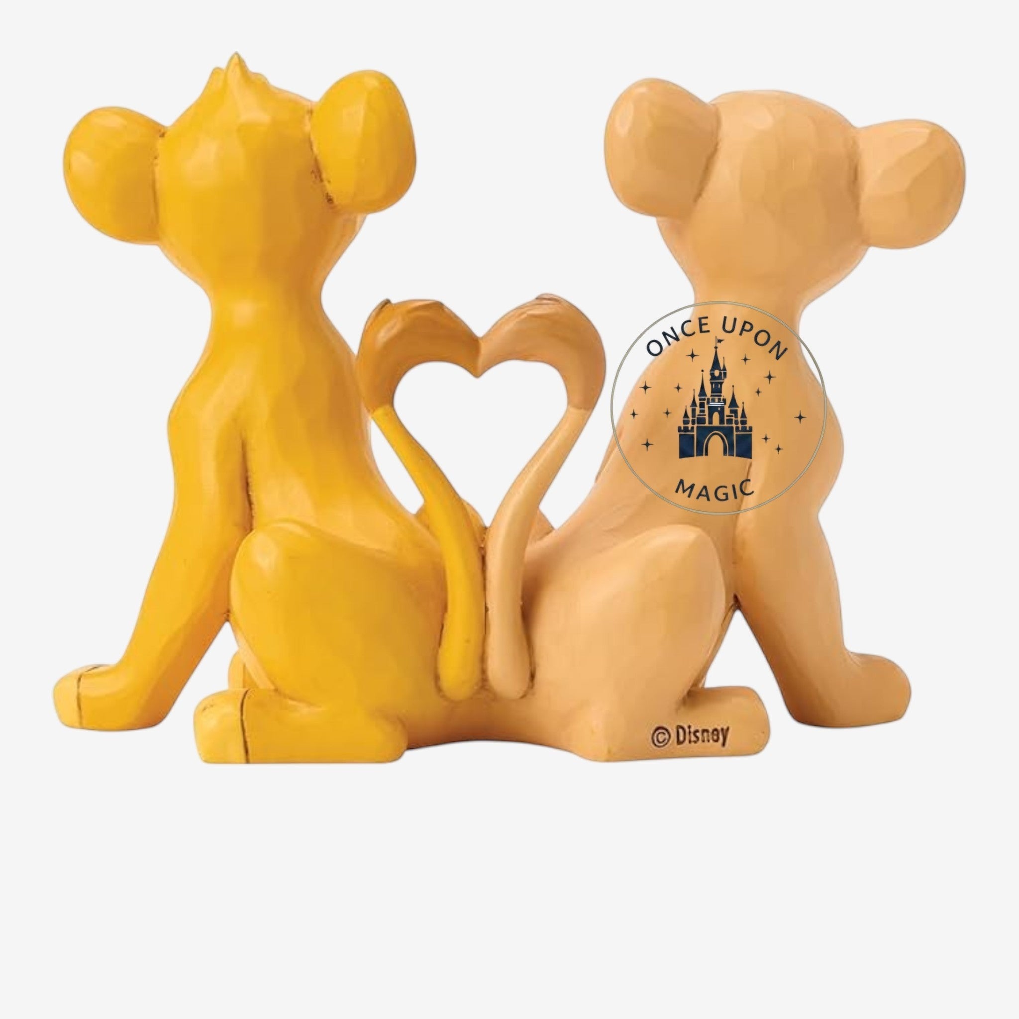 Once Upon Magic Simba and Nala figurine featuring the two lion cubs sitting back to back with their tails forming a heart