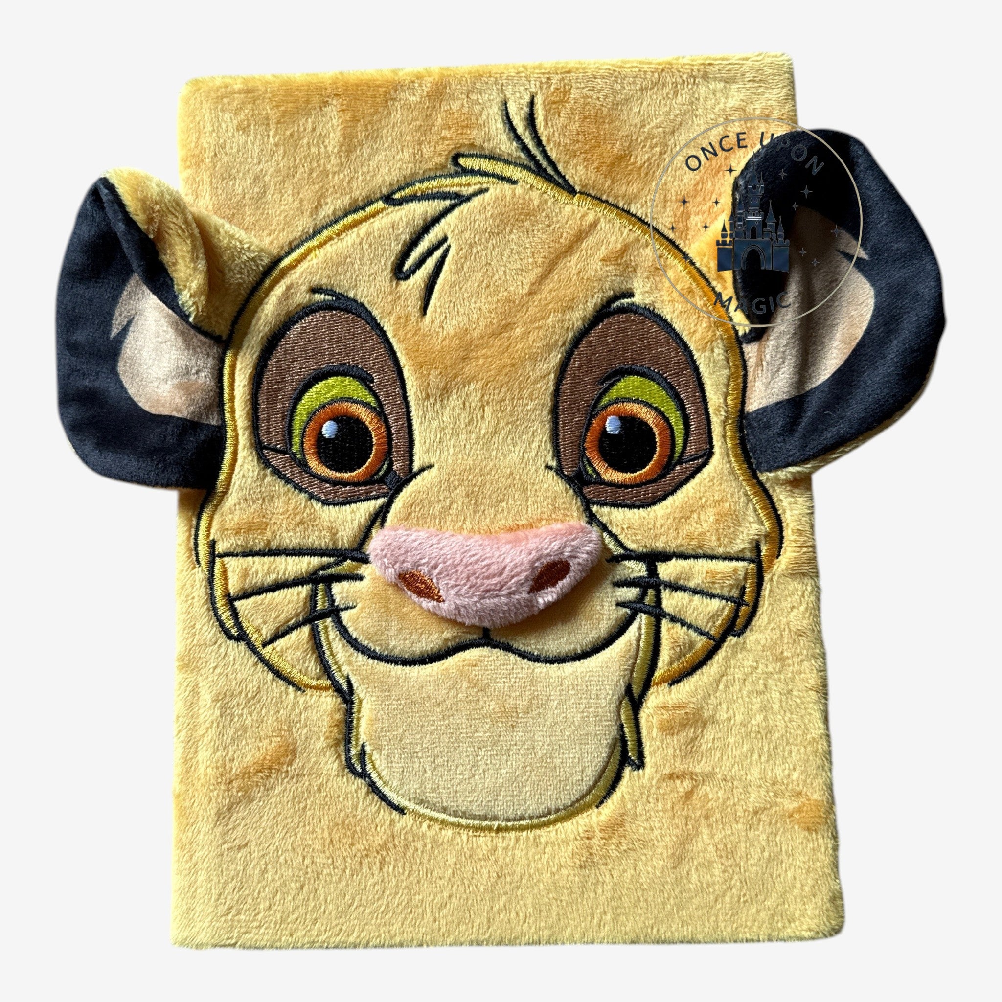 Once Upon Magic yellow plush Simba notebook with 3D ears and embroidered face details.