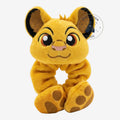 Once Upon Magic yellow plush Simba scrunchie with embroidered face and paw details. A fun hair accessory.