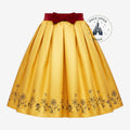 Once Upon Magic Snow White themed yellow striped skirt with a red belt and apple embroidery detail on the hem.