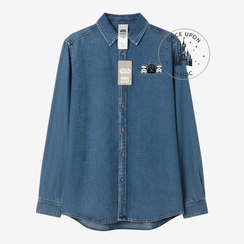 Once Upon Magic medium-wash denim button-down shirt with Star Wars character embroidery on the chest.
