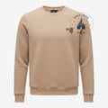 Once Upon Magic beige Star Wars sweatshirt featuring embroidered Han Solo and Chewbacca icons on the chest.