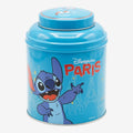 Once Upon Magic blue tin tea box featuring Stitch pointing with Disneyland Paris landmarks. Includes organic red fruit black tea.