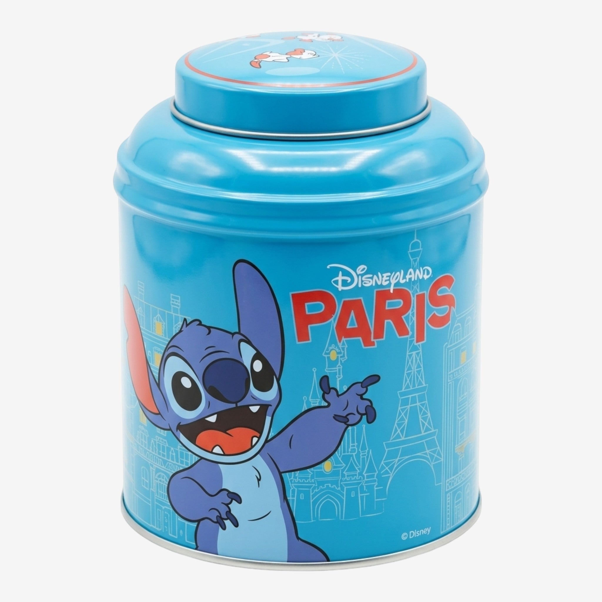 Once Upon Magic blue tin tea box featuring Stitch pointing with Disneyland Paris landmarks. Includes organic red fruit black tea.