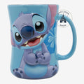 Once Upon Magic blue ceramic mug featuring a smiling Stitch character with tropical flowers. Ideal for coffee or tea.
