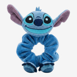 Once Upon Magic blue plush Stitch scrunchie with character ears, eyes, and grin. Soft fabric hair accessory.
