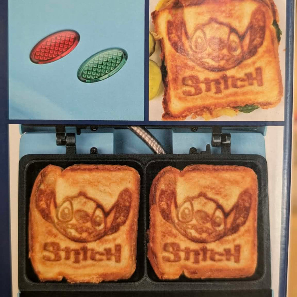 Once Upon Magic blue Stitch character sandwich maker with two toasted sandwiches featuring Stitch imprints.