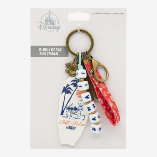 Once Upon Magic Disney Stitch bag charm with surfboard, hibiscus flower, and beads spelling '626'.
