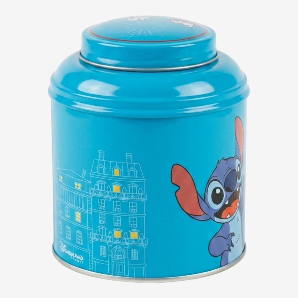 Once Upon Magic blue tin tea box featuring Stitch and a Parisian building, with bio red fruits black tea inside.