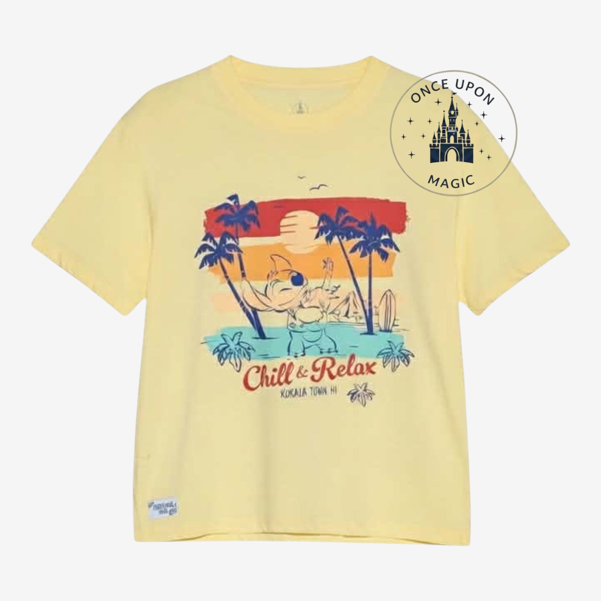 Once Upon Magic pastel yellow Stitch t-shirt with a vintage tropical sunset postcard print and Chill & Relax text.