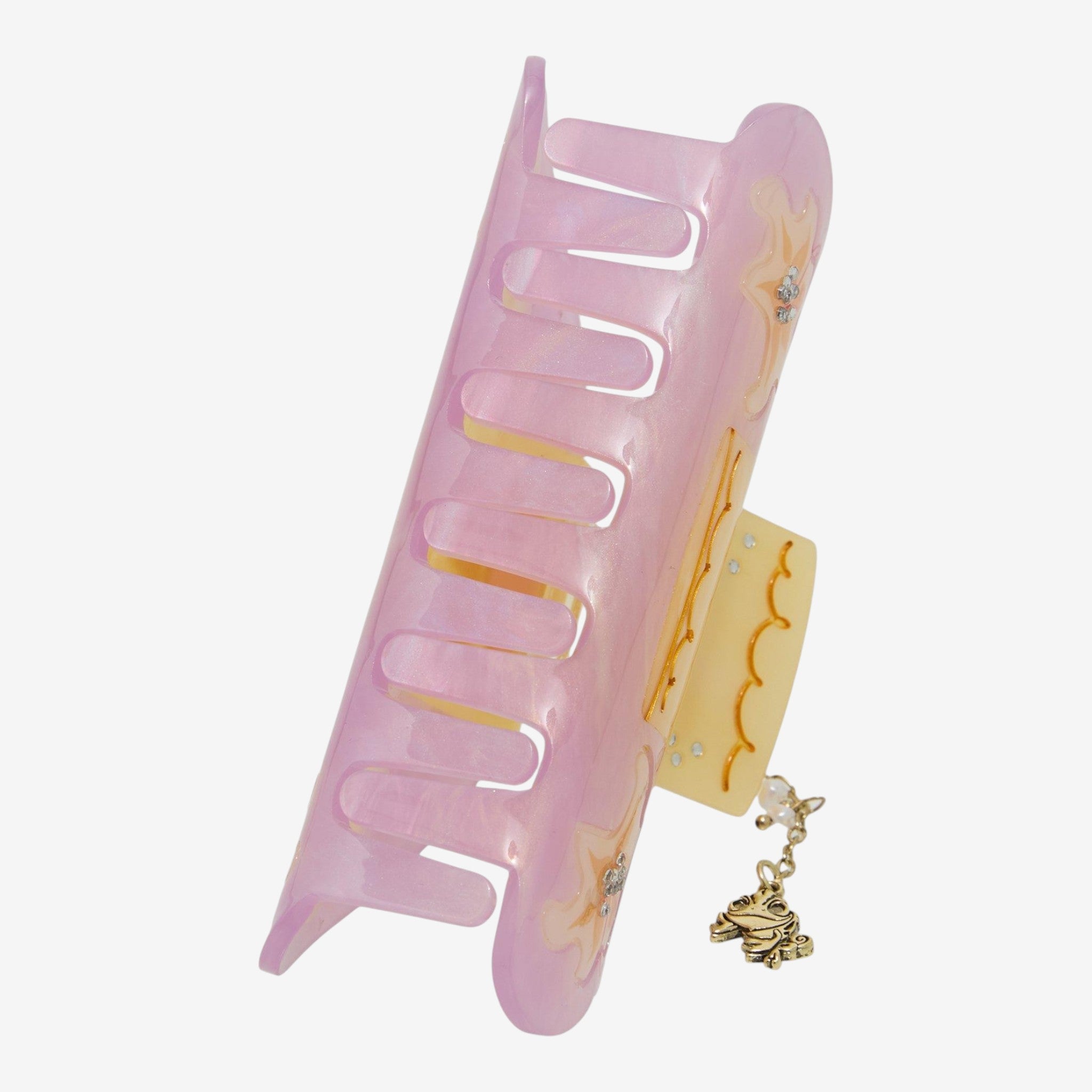 Once Upon Magic exclusive Disney Tangled lantern claw clip with frog charm. Iridescent pink and yellow.