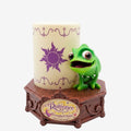 Once Upon Magic Tangled Rapunzel sun symbol lamp with Pascal the chameleon on a decorative base.