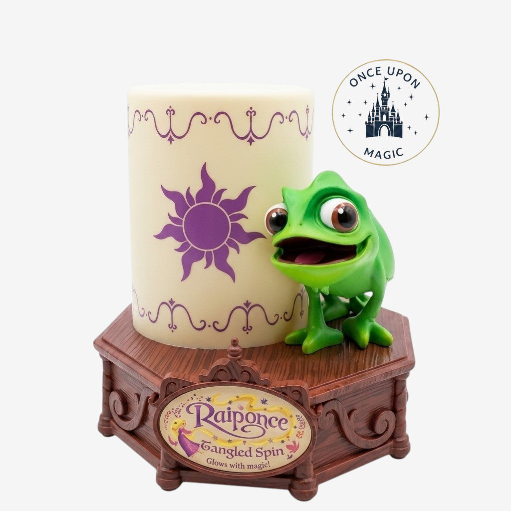 Once Upon Magic Tangled Rapunzel sun symbol lamp with Pascal the chameleon on a decorative base.
