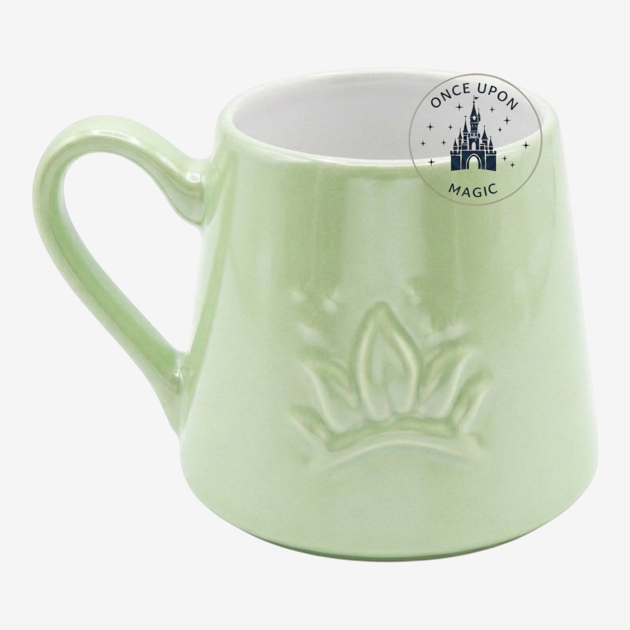 Once Upon Magic Tiana ceramic mug in light green with a raised crown design inspired by The Princess and the Frog