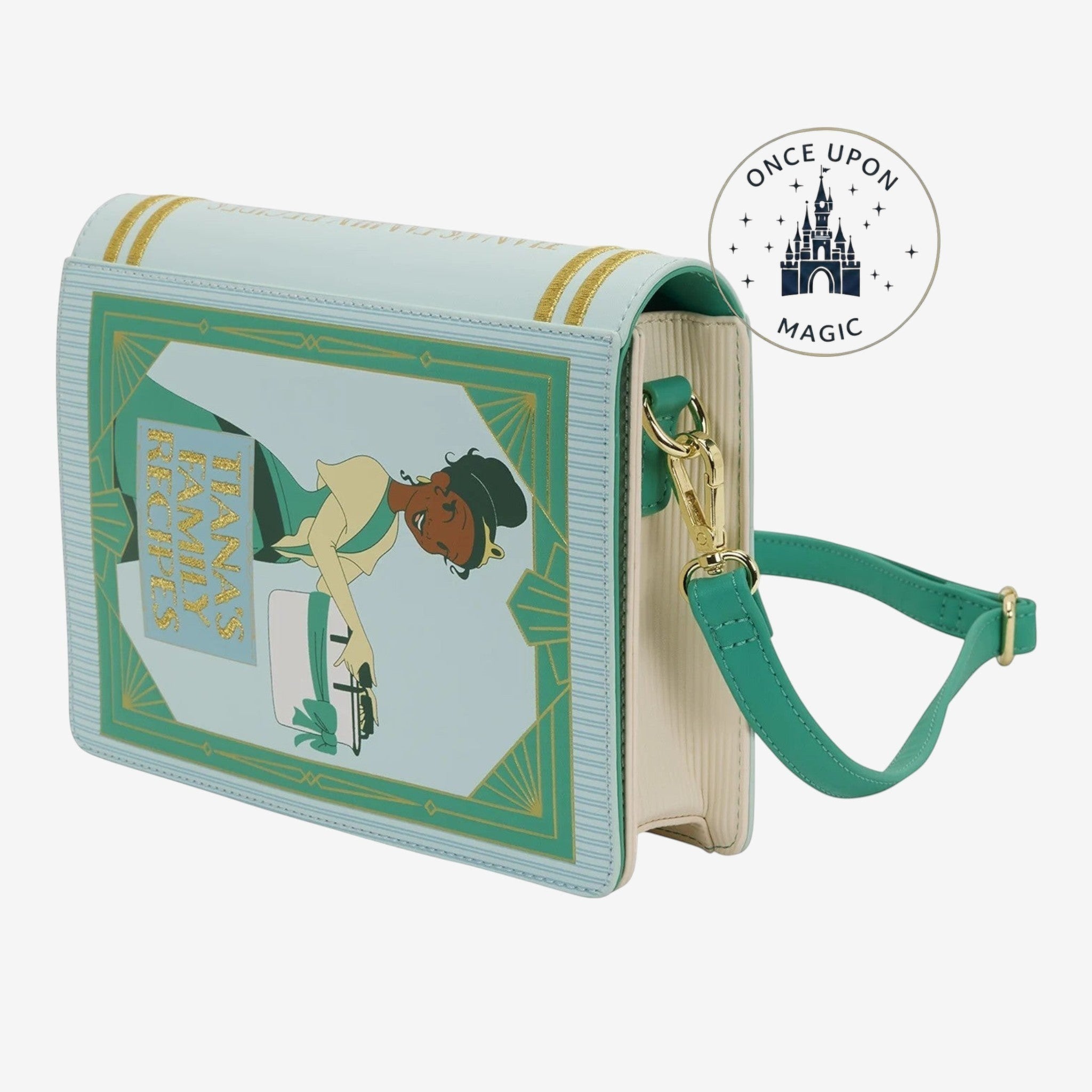 Once Upon Magic light blue faux leather crossbody bag designed as a storybook with Princess Tiana illustration and gold trim.