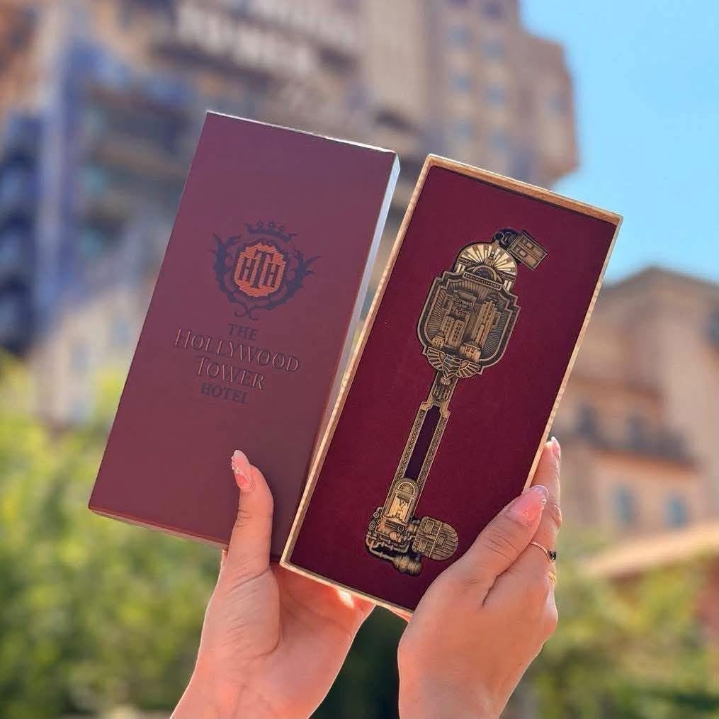 Once Upon Magic jumbo Tower of Terror collectible key in aged gold with Art Deco details inside a burgundy HTH box