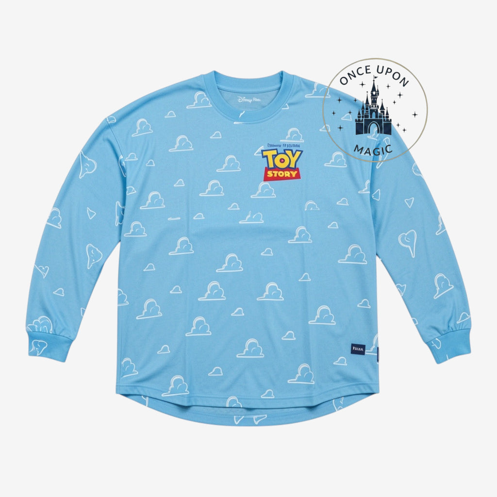 Once Upon Magic light blue Toy Story sweatshirt with white cloud pattern and chest logo, Disneyland Paris exclusive.