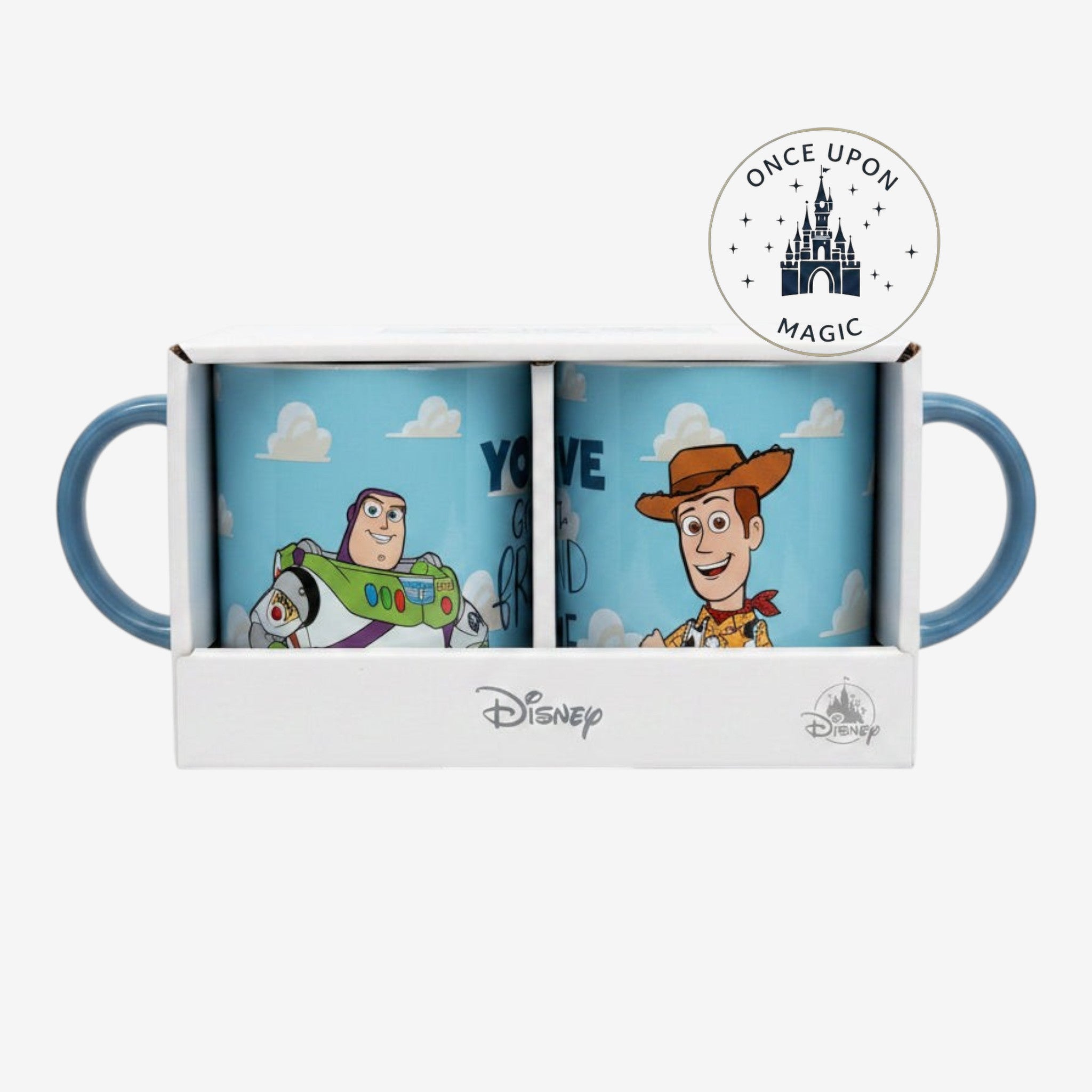 Once Upon Magic Toy Story ceramic mug gift set featuring Woody and Buzz Lightyear on a blue sky and cloud background.