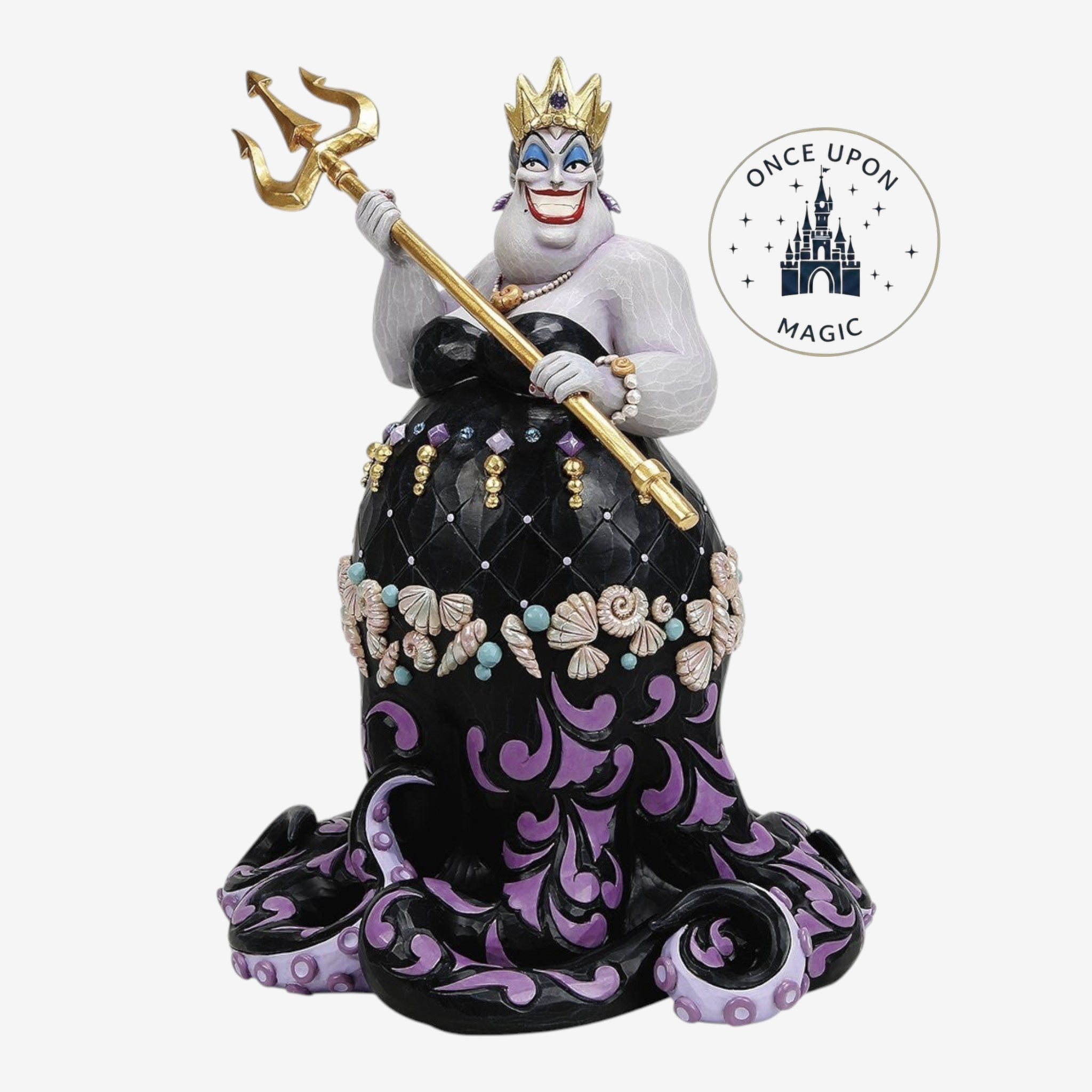 Once Upon Magic Ursula figurine with golden trident, black gown, purple swirls, seashells, and pearls. Resin.