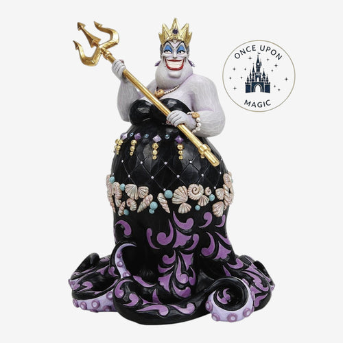 Once Upon Magic Ursula figurine with golden trident, black gown, purple swirls, seashells, and pearls. Resin.