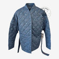 Once Upon Magic blue quilted Vaiana jacket with ocean-inspired patterns and a tie-waist belt.